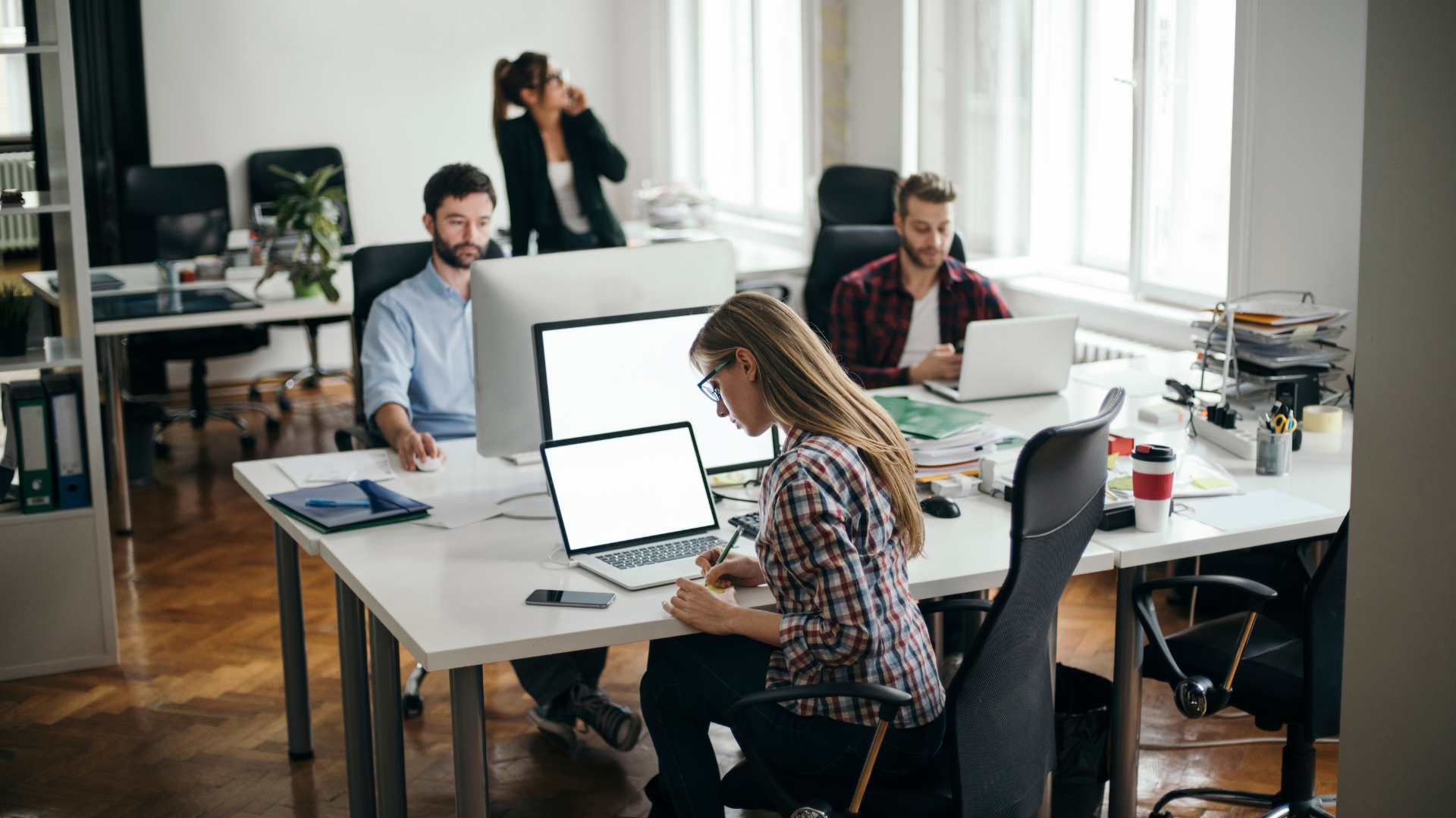 People working in a modern office environment.